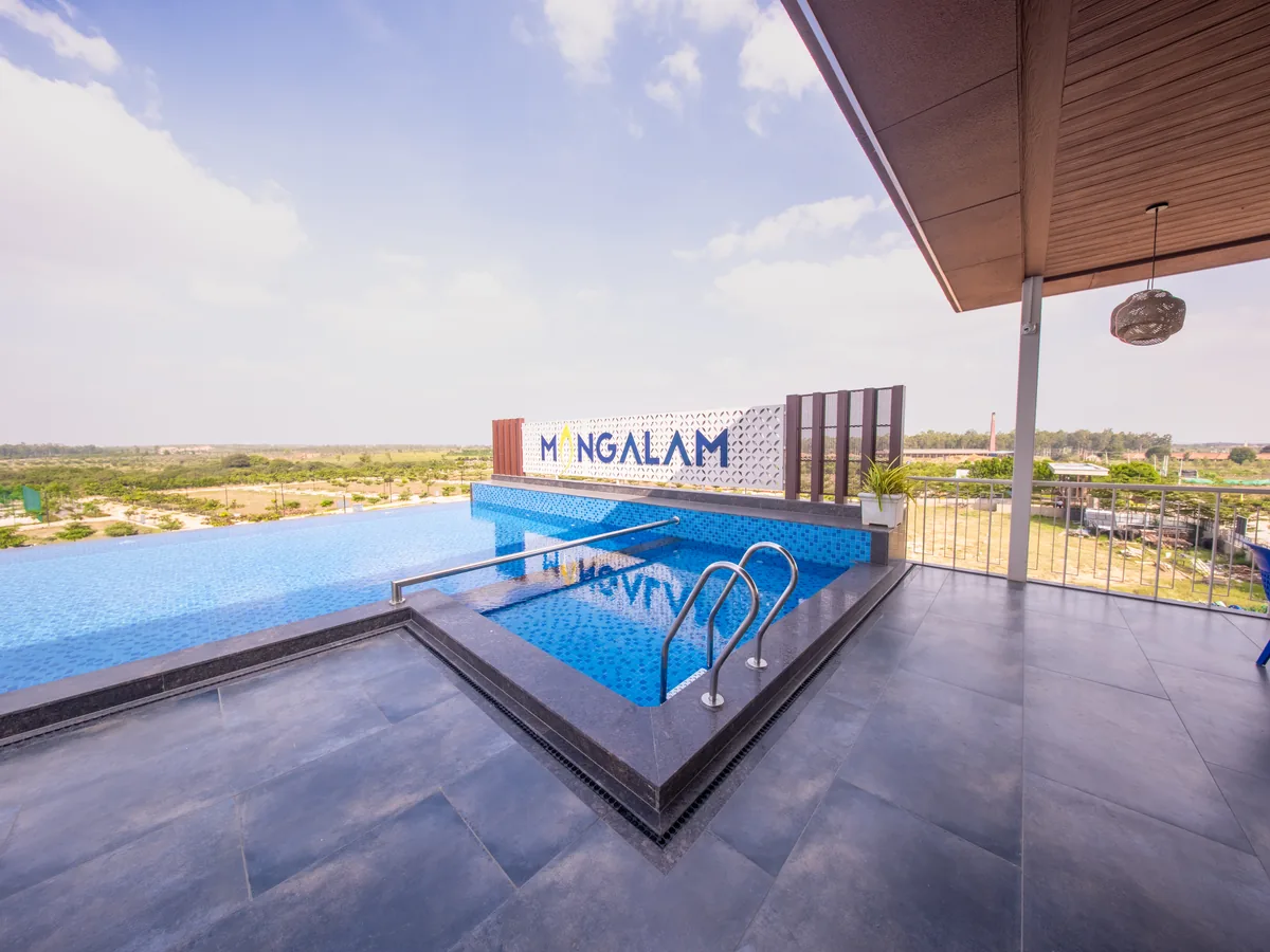 Infinity pool and deck at the Aura Ville clubhouse